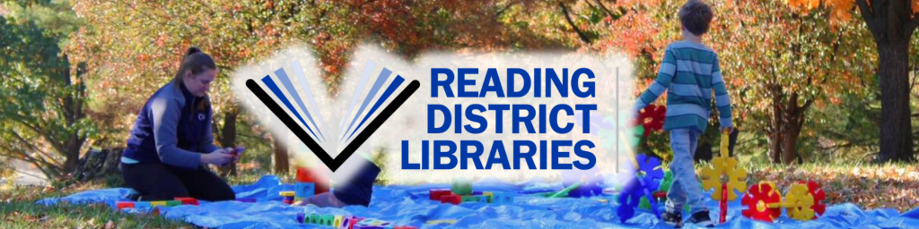 reading district libraries logo, child and caregiver playing with blocks in the grass