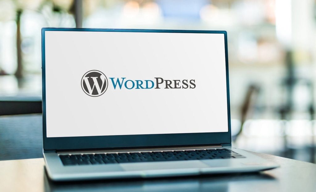 laptop with WordPress logo on screen