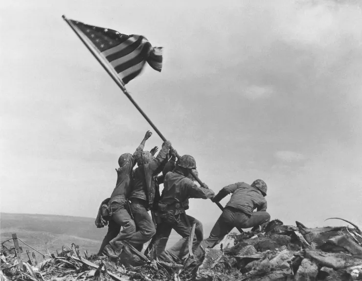 U.S. Marines raising the American flag on Mount Suribachi 